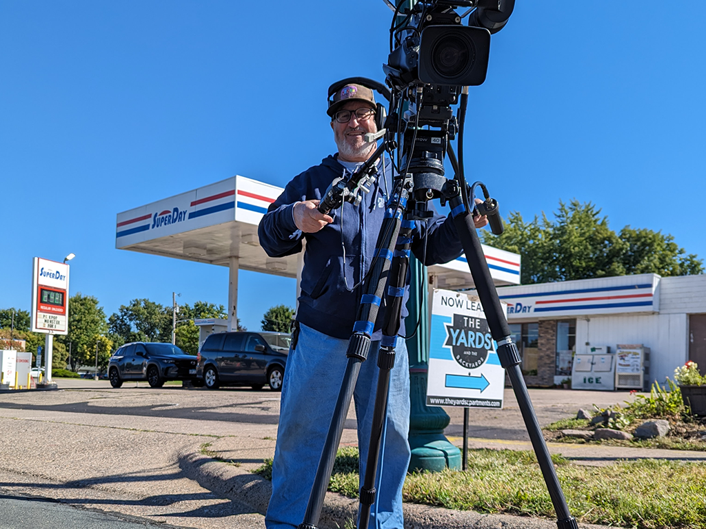 Camera operator with camera