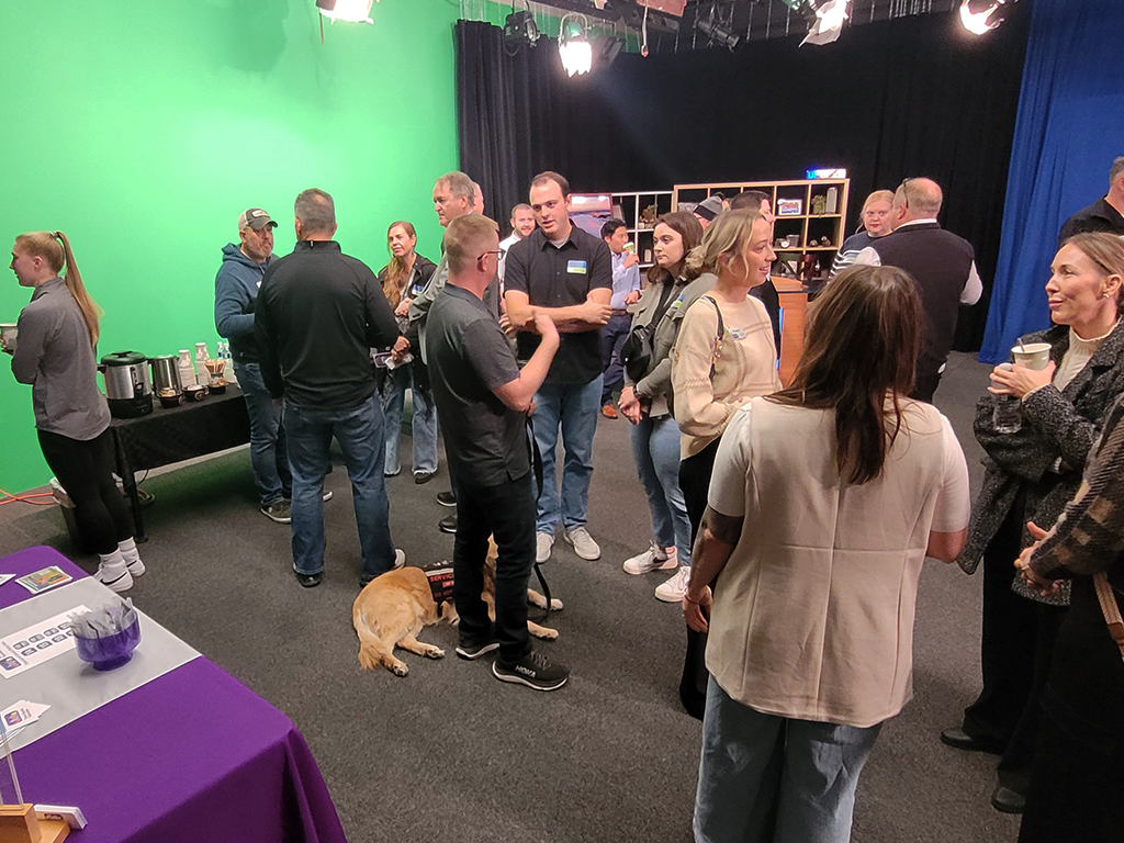 Gathering of people in Town Square Television studio