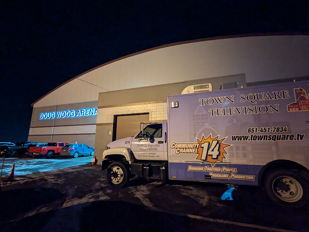 Town Square TV production truck outside Doug Woog Arena at night